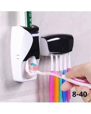Дозатор зубной пасты с держателем для зубных щеток.
