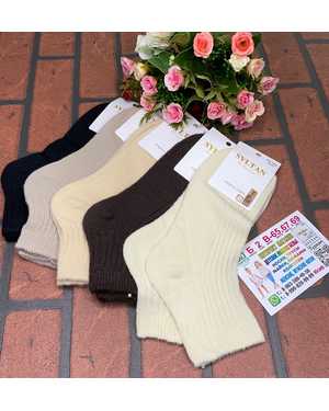 Женские тёплые носки Состав:Шерсть Ламы 85% Полиамид 15% Размер:36-41 Цена за упаковку 10пар