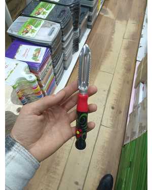 Овощечистка с деревянной ручкой