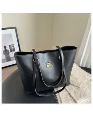 Женская сумка. Размер: 24*12.5*31см