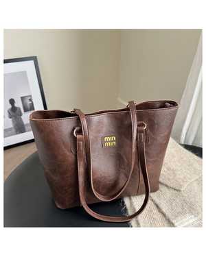 Женская сумка. Размер: 24*12.5*31см