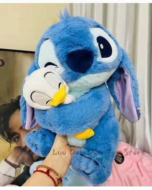 ПОСТУЛЕНИЯ ПЛЮШЕВЫЙ МЯГКАЯ ИГРУШКА 25 СМ МАТЕРИАЛ: СТИЧ С УТКА 2 ЦВЕТА