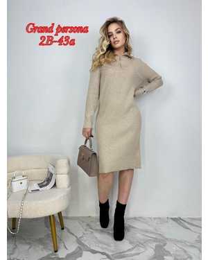 Женское Платье выполнено из вязаного трикотажа